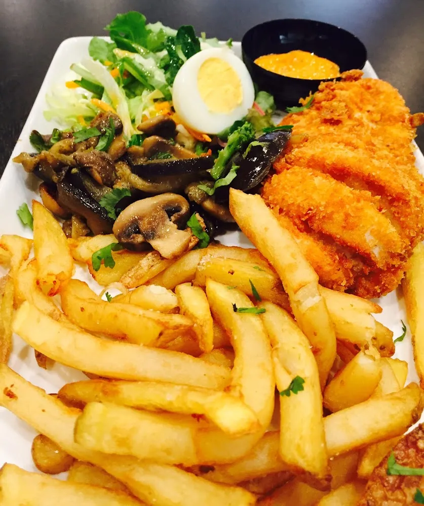 Accompagné de Frites Maison